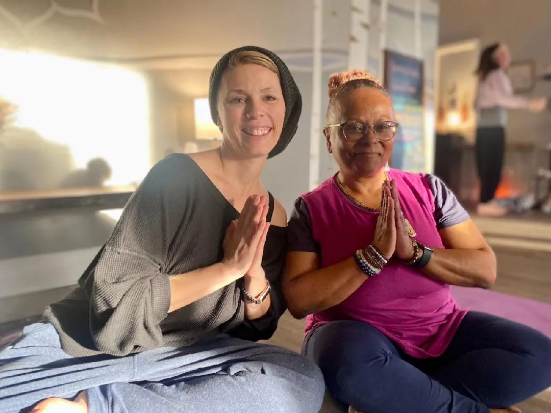 Two Serendipity students greeting each other in anjali mudra